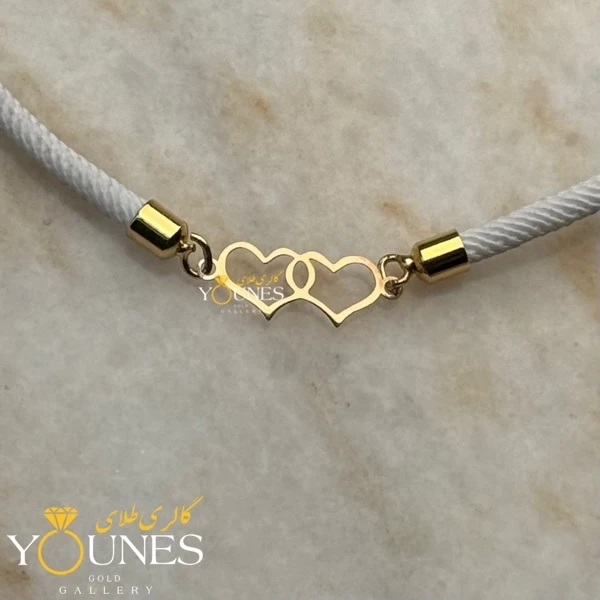 دستبند دو قلب مینیمال طلا لیزری